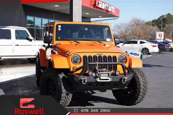 Used 2013 Jeep Wrangler Unlimited Sahara for sale $31,993 at Gravity Autos Roswell in Roswell GA