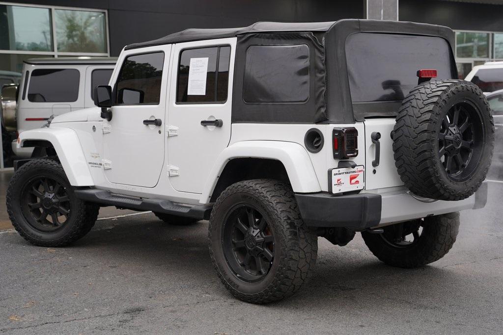 Used 2013 Jeep Wrangler Unlimited Sahara for sale Sold at Gravity Autos Roswell in Roswell GA 30076 10
