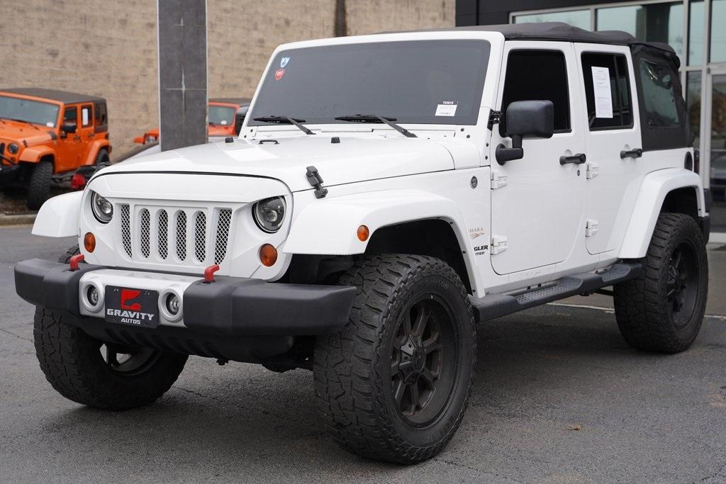 Used 2013 Jeep Wrangler Unlimited Sahara for sale Sold at Gravity Autos Roswell in Roswell GA 30076 4