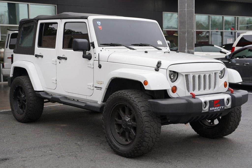 Used 2013 Jeep Wrangler Unlimited Sahara for sale Sold at Gravity Autos Roswell in Roswell GA 30076 6