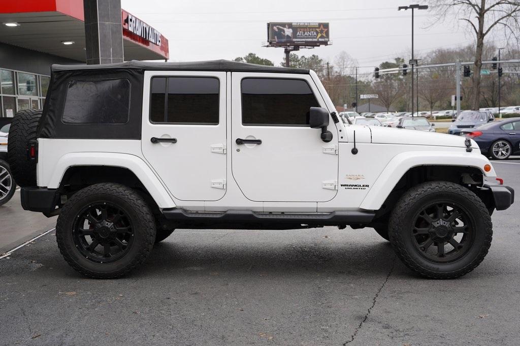 Used 2013 Jeep Wrangler Unlimited Sahara for sale Sold at Gravity Autos Roswell in Roswell GA 30076 7