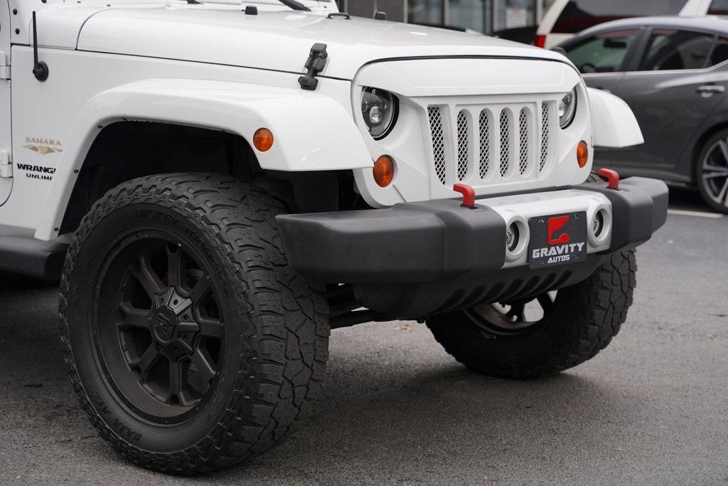 Used 2013 Jeep Wrangler Unlimited Sahara for sale Sold at Gravity Autos Roswell in Roswell GA 30076 8