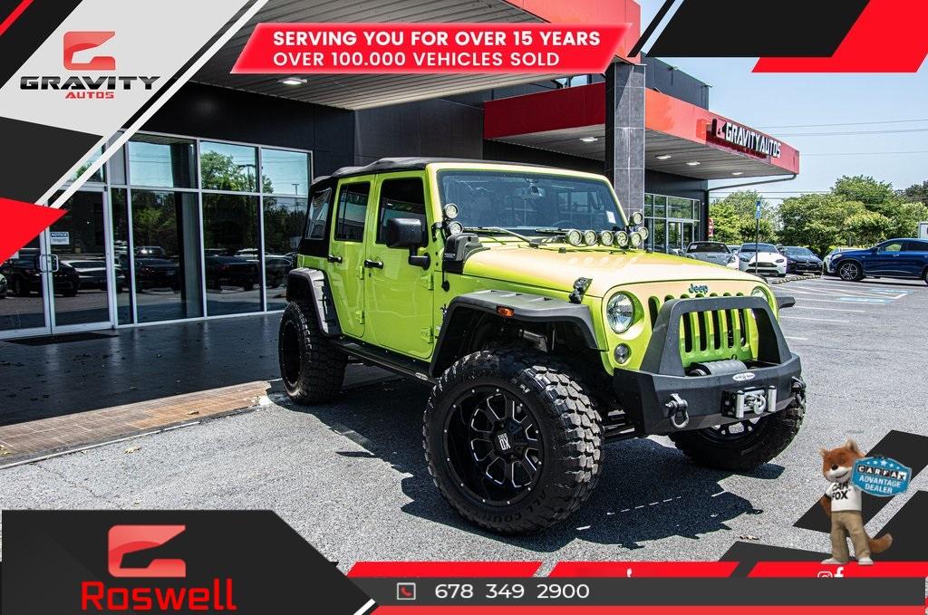 Used 2016 Jeep Wrangler Unlimited Sport for sale Sold at Gravity Autos Roswell in Roswell GA 30076 1
