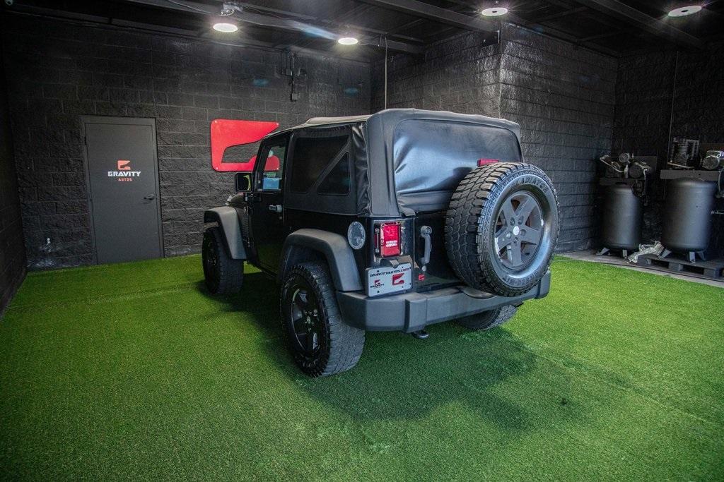 Used 2014 Jeep Wrangler Sport for sale $27,991 at Gravity Autos Roswell in Roswell GA 30076 3