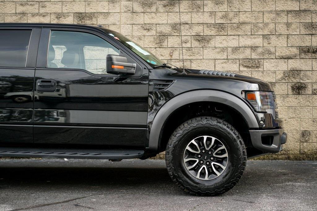 Used 2014 Ford F-150 SVT Raptor for sale $36,992 at Gravity Autos Roswell in Roswell GA 30076 15