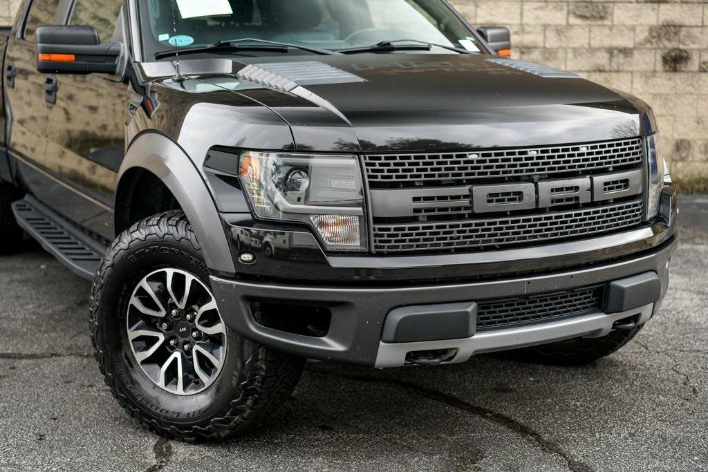 Used 2014 Ford F-150 SVT Raptor for sale $36,992 at Gravity Autos Roswell in Roswell GA 30076 6