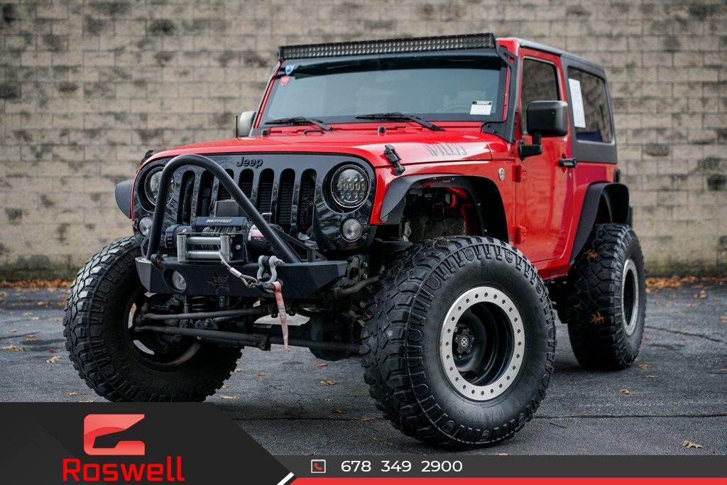 Used 2017 Jeep Wrangler Willys Wheeler for sale $37,992 at Gravity Autos Roswell in Roswell GA 30076 1