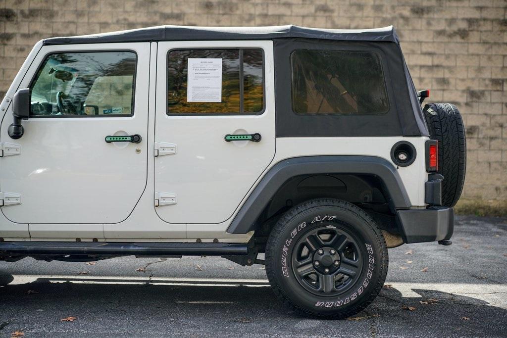 Used 2017 Jeep Wrangler Unlimited Sport for sale $33,992 at Gravity Autos Roswell in Roswell GA 30076 10