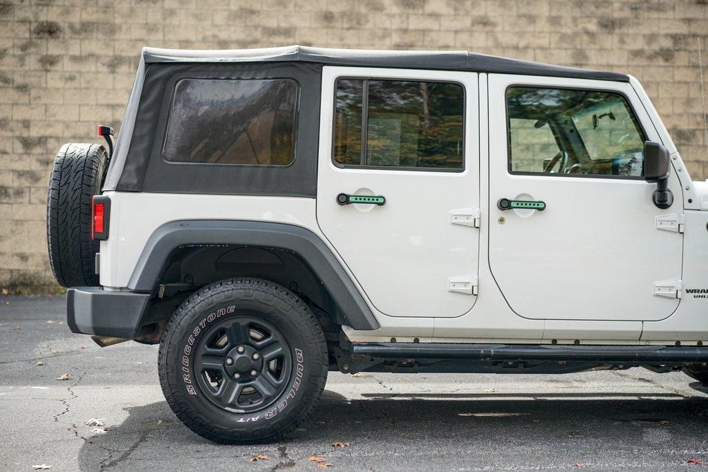 Used 2017 Jeep Wrangler Unlimited Sport for sale $33,992 at Gravity Autos Roswell in Roswell GA 30076 14