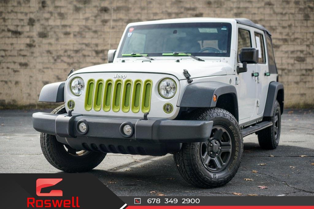Used 2017 Jeep Wrangler Unlimited Sport for sale $33,992 at Gravity Autos Roswell in Roswell GA 30076 1