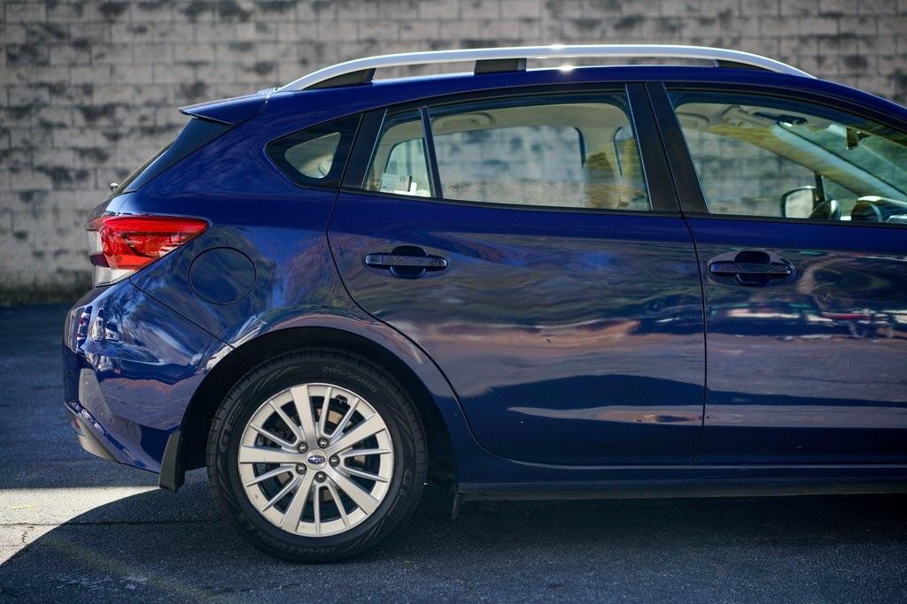 Used 2017 Subaru Impreza 2.0i Premium for sale $21,292 at Gravity Autos Roswell in Roswell GA 30076 14