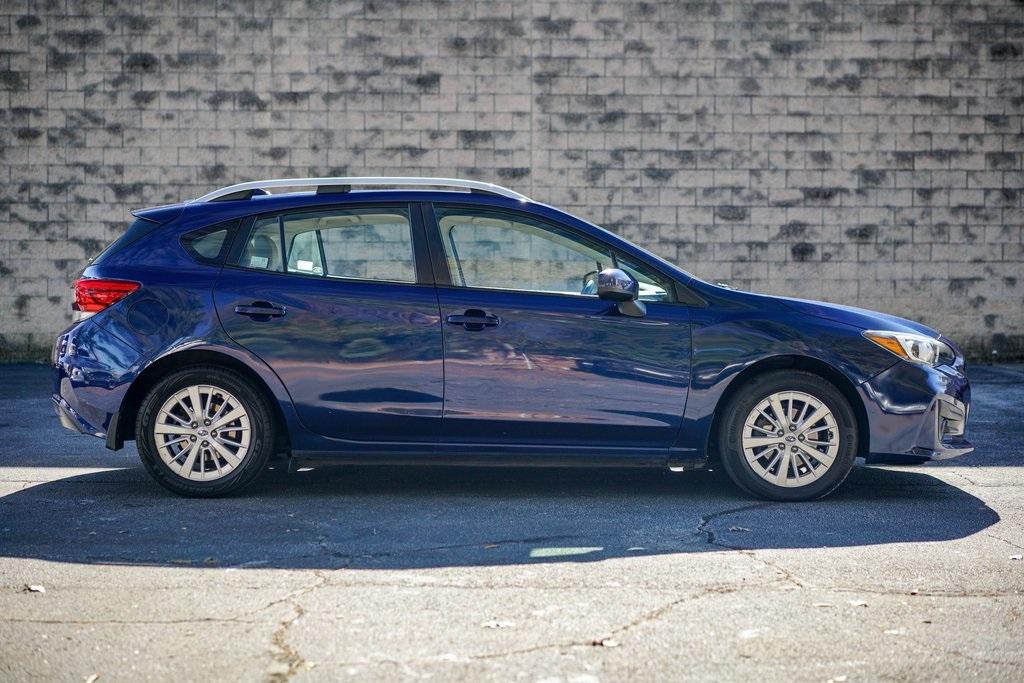 Used 2017 Subaru Impreza 2.0i Premium for sale $21,292 at Gravity Autos Roswell in Roswell GA 30076 16