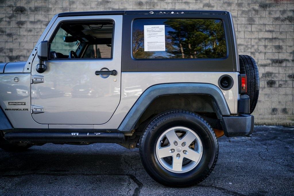 Used 2013 Jeep Wrangler Sport for sale $26,492 at Gravity Autos Roswell in Roswell GA 30076 10
