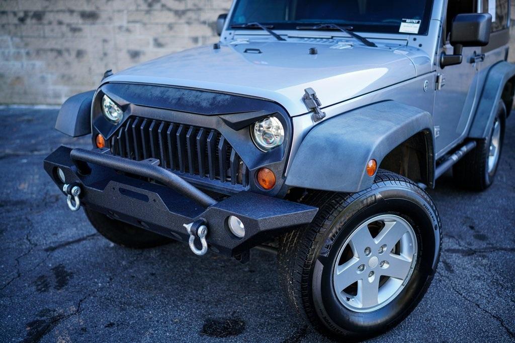 Used 2013 Jeep Wrangler Sport for sale $26,492 at Gravity Autos Roswell in Roswell GA 30076 2