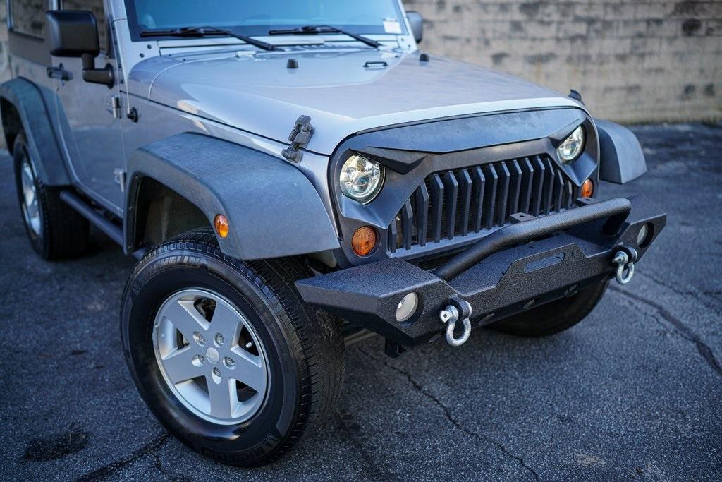Used 2013 Jeep Wrangler Sport for sale $26,492 at Gravity Autos Roswell in Roswell GA 30076 6