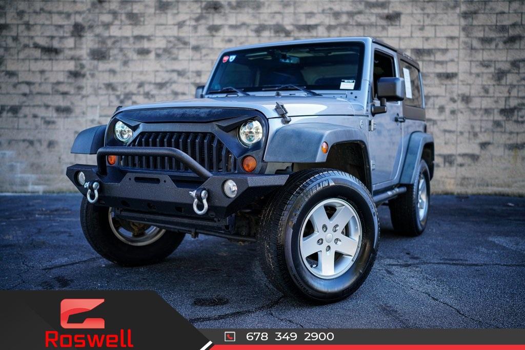 Used 2013 Jeep Wrangler Sport for sale $26,492 at Gravity Autos Roswell in Roswell GA 30076 1