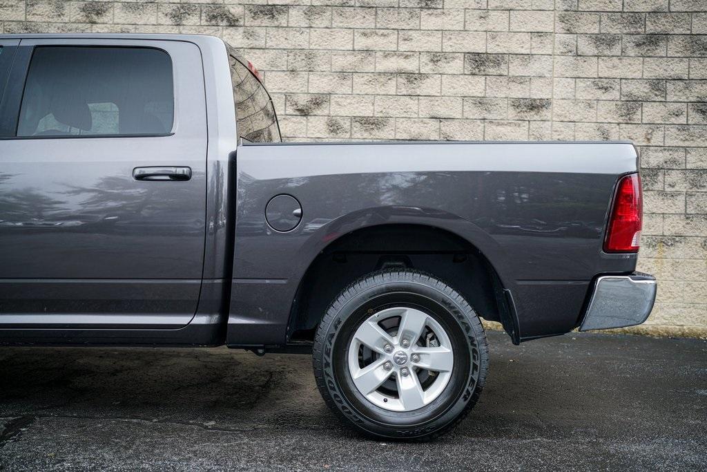 Used 2021 Ram 1500 Classic SLT for sale $37,981 at Gravity Autos Roswell in Roswell GA 30076 10