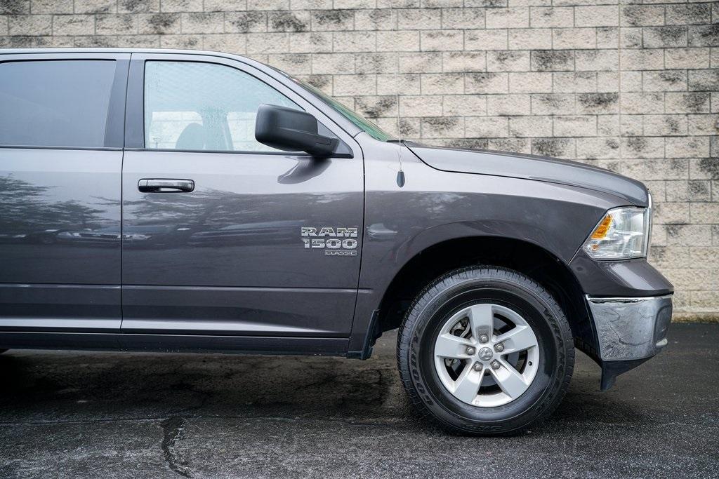 Used 2021 Ram 1500 Classic SLT for sale $37,981 at Gravity Autos Roswell in Roswell GA 30076 15