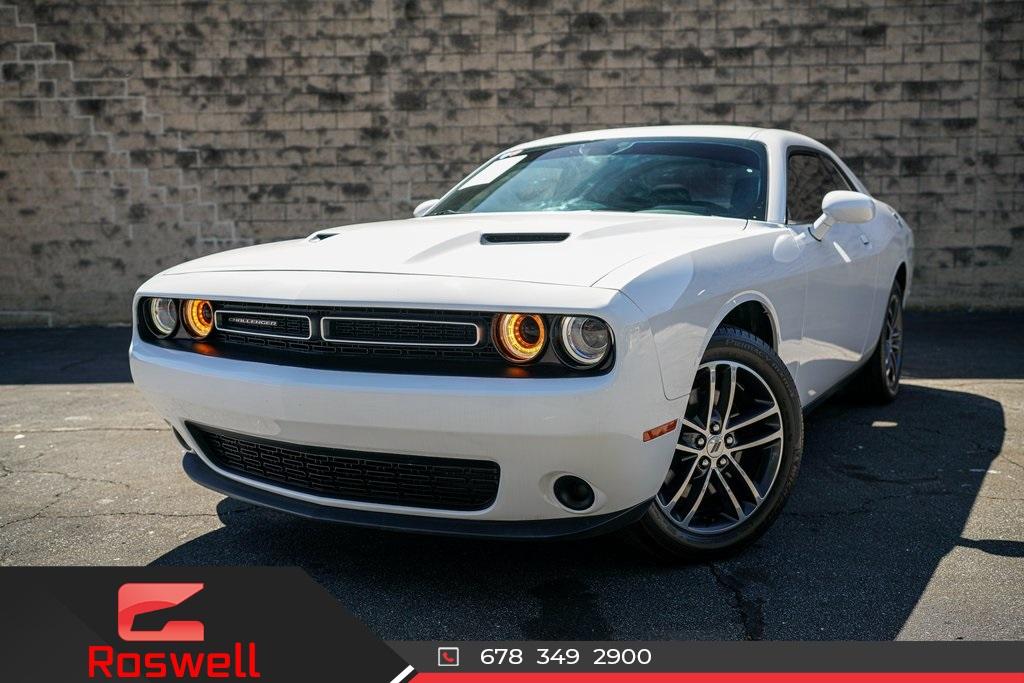 Used 2019 Dodge Challenger SXT for sale $31,992 at Gravity Autos Roswell in Roswell GA 30076 1